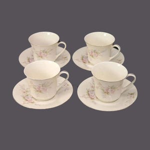 Four Sadler Romance cup and saucer sets.