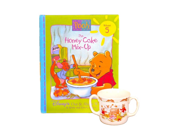 New baby gift. Royal Doulton Bunnykins double-handled mug and Disney Out and About with Pooh Volume 5 book The Honey Cake Mix-Up.