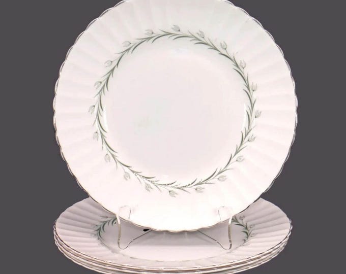Four Susie Cooper Lady Barbara dinner plates. Bone china made in England.