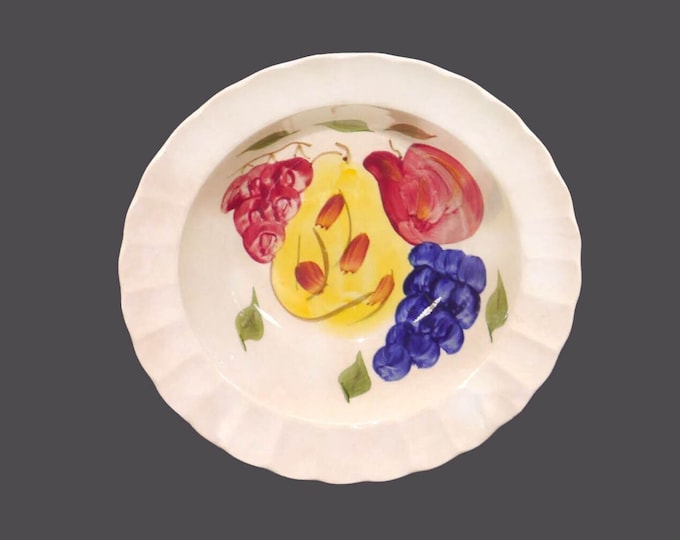 Sovereign Potters round, rimmed serving bowl. Hand-painted fruit in the style of Solian Ware. Flaws (see below).