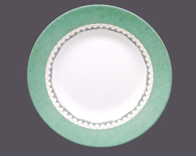 Arcopal rimmed glass soup bowl. Sponged green rim, green triangles, gray bars made in France. Sold individually.