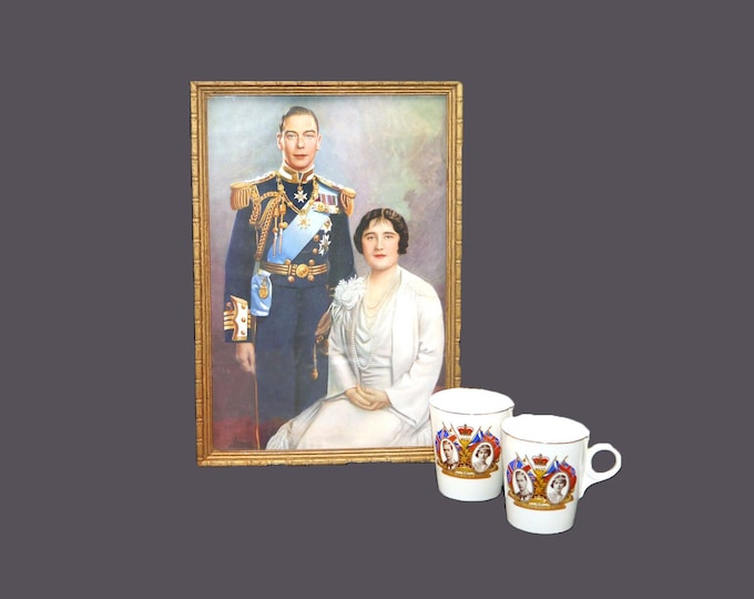 Royalty set. Framed color portrait of King George and Queen Elizabeth and two Coronation mugs. New Percival Furniture Co.