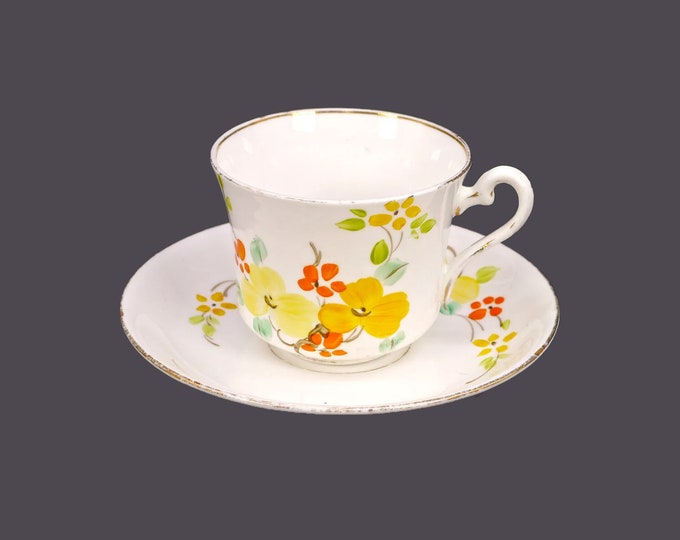 Almost antique Phoenix Bone China hand-painted cup and saucer | tea set made in England. Orange, yellow flowers. Flaws (see below).