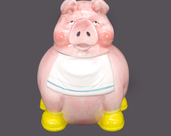 Living Art cookie jar with vacuum-seal lid. Pink pig with bib and yellow boots. Too cute kitchen decor.