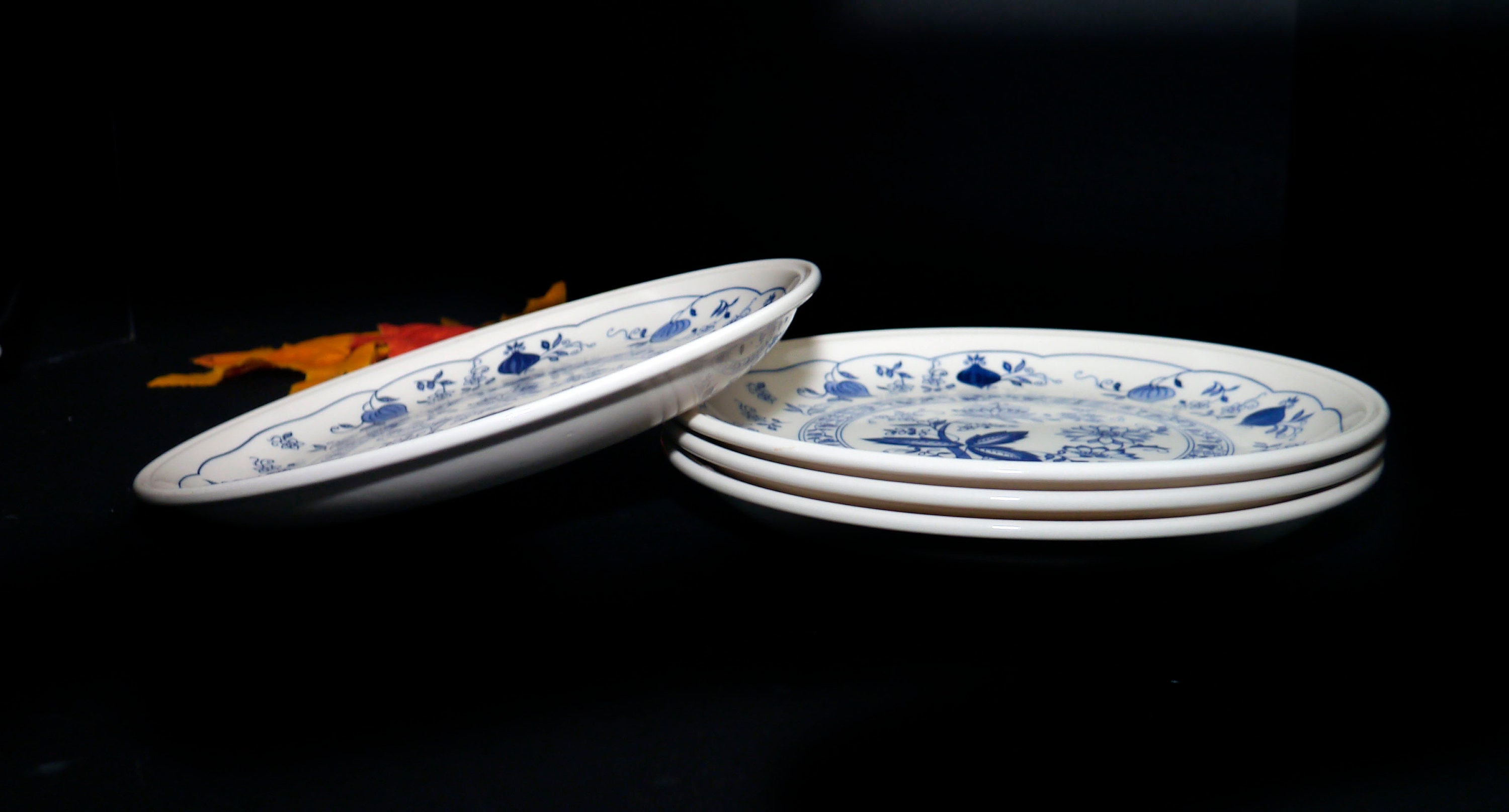 Four Biltons Blue Onion dinner plates made in England.