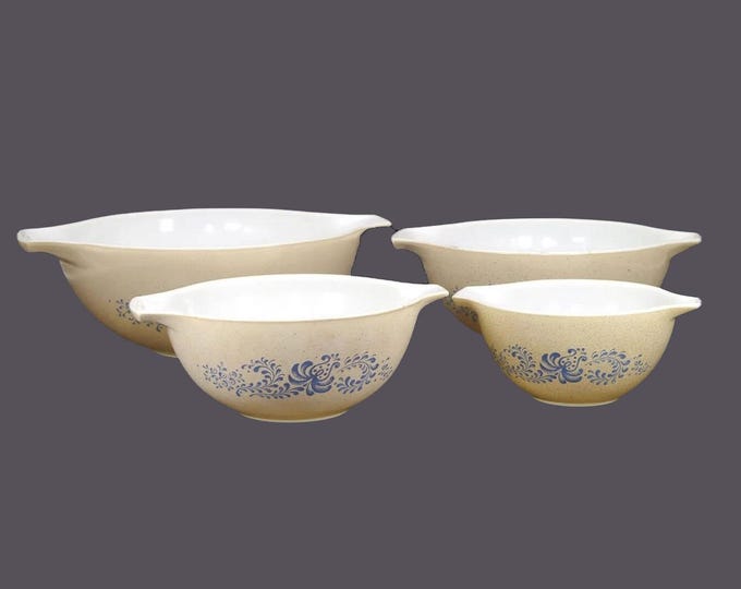 Four Pyrex Homestead cinderella mixing bowls. Vintage Pyrex made in USA.