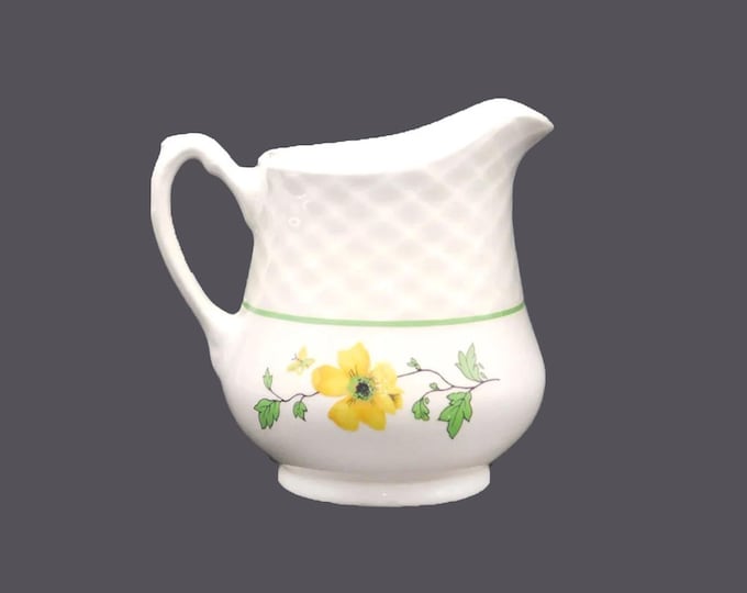 Wedgwood Jacqueline creamer jug made in England. Flaw (see below).