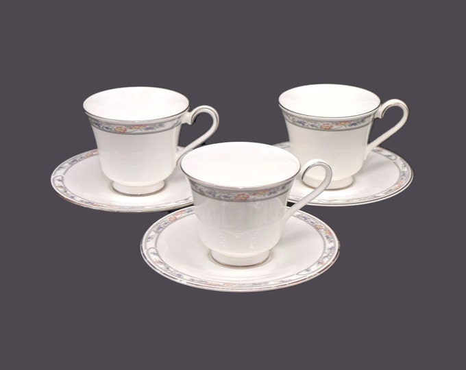 Three Royal Doulton Arlington H5180 bone china cup and saucer sets made in England.