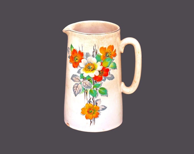 Lord Nelson Pottery pitcher made in England. Orange, yellow flowers. Flaws (see below).