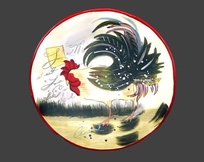 Certified International Le Rooster salad plate designed by Susan Winget. Central rooster, scripted words.