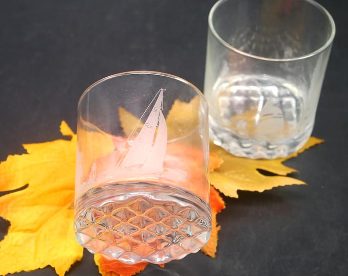 Pair of True North Bluenose sailing ship etched-glass lo ball, scotch whisky, old-fashioned glasses made in Canada.