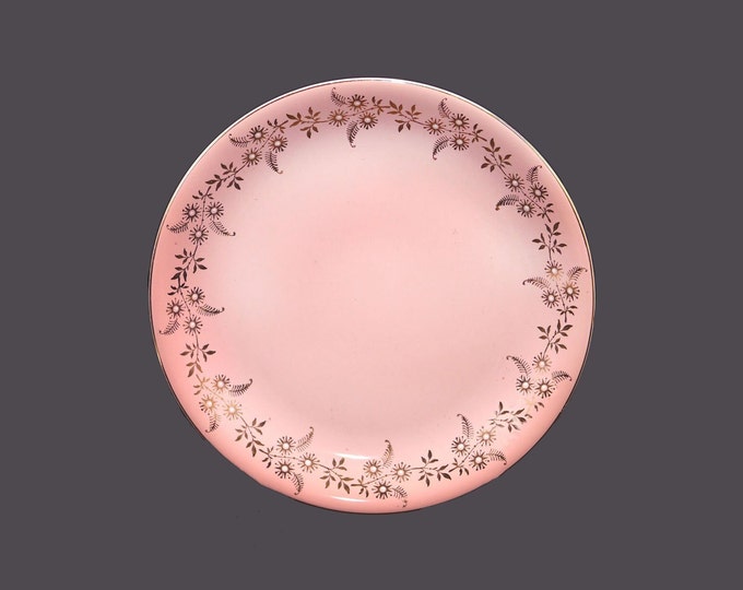 British Anchor Pottery luncheon or small dinner plate. Pink ground, gold and white flowers, gold edge. Made in England.