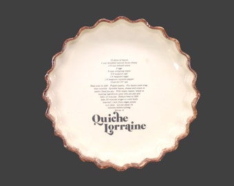Quiche Lorraine pan. Crimped sides, recipe in center.