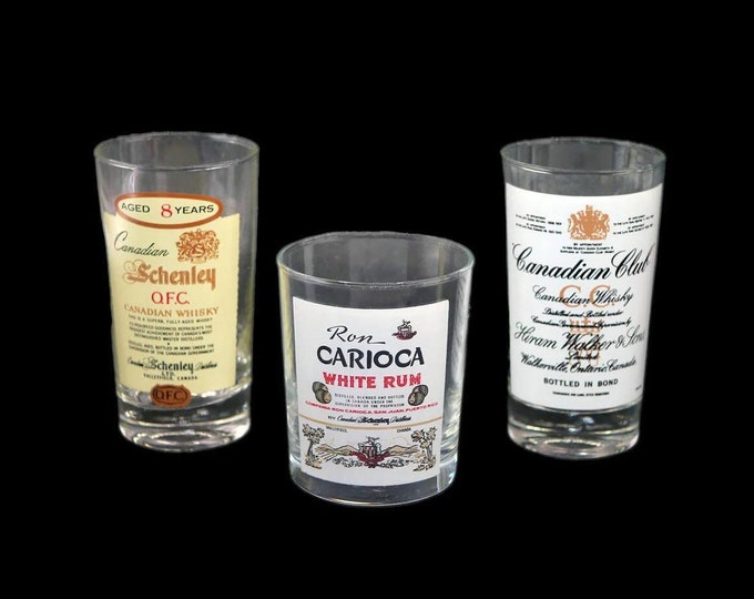 Trio of glasses Canadian Club, Schenley OFC and Carioca White Rum. Etched-glass branding.