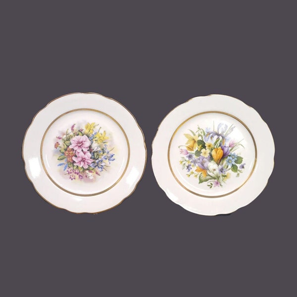 Pair of AJL Giftware Flowers of the Season porcelain plates made in England.
