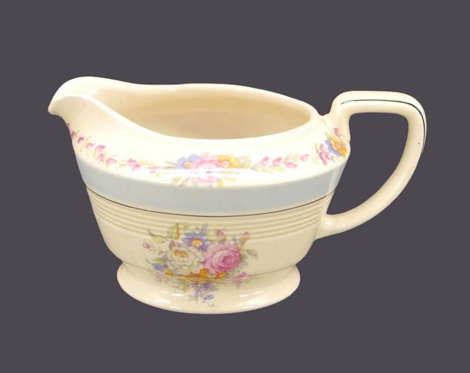 Wood & Sons creamer jug. Wood's Ivory Ware made in England. Central bouquet with roses, light blue band.