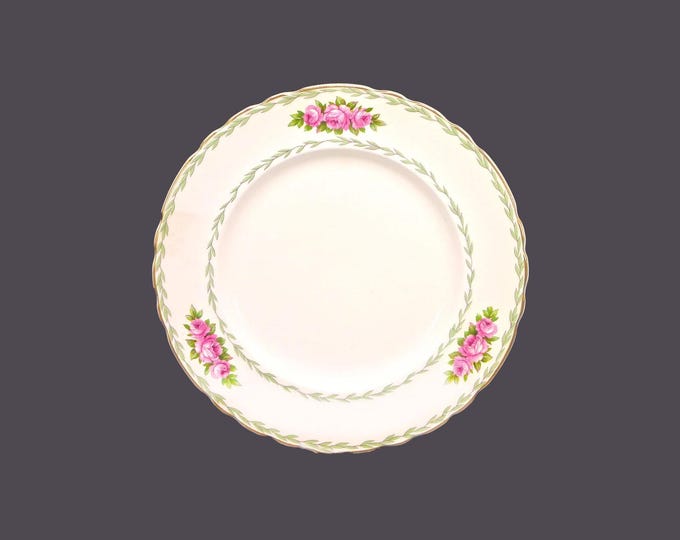 Arthur J. Wilkinson | Royal Staffordshire 1298 dinner plate. Pink rose trio, green laurels. Made in England. Sold individually.
