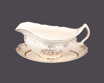 Sovereign Potters Windsor gravy boat with under-plate. Flaws (see below).