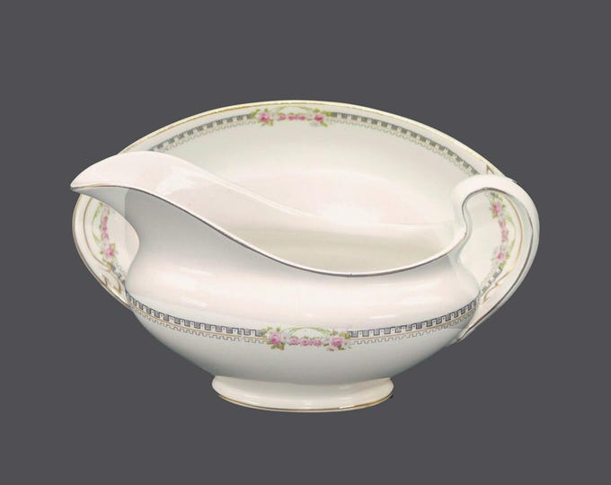 Antique Edwardian Age Johnson Brothers JB185 gravy boat with lugged under-plate made in England.