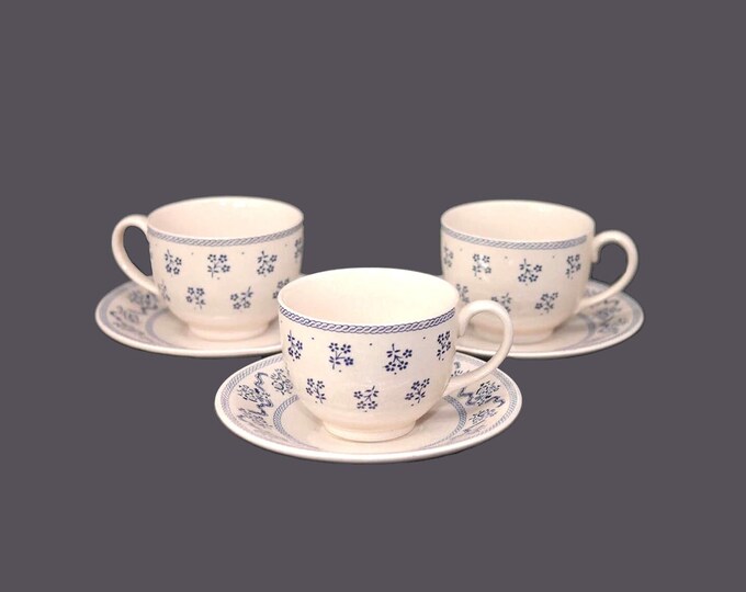 Three Johnson Brothers Petite Fleur cup and saucer sets made in England.