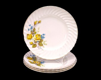 Four Ridgway Favourite Rose dinner plates made in England.