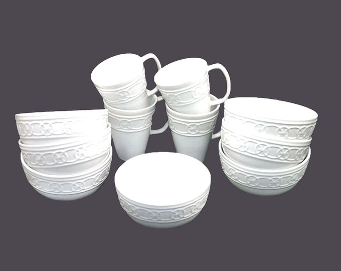 Eleven pieces of Pfaltzgraff | Cuisinart Links stoneware. Four coffee | tea mugs seven cereal bowls.