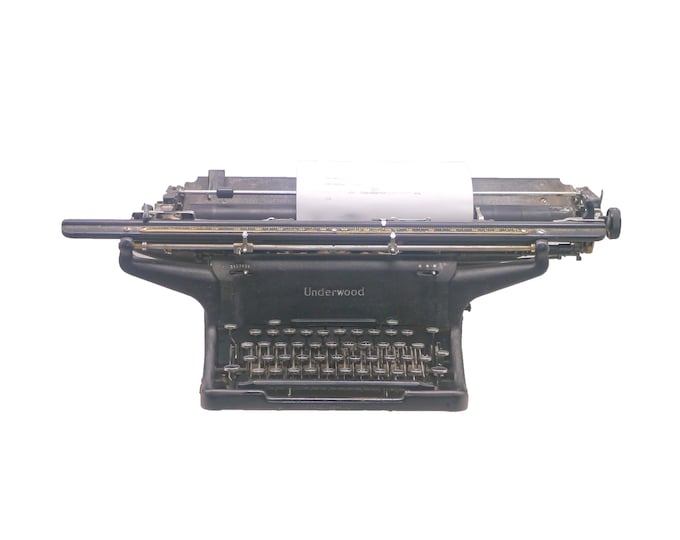 Underwood Elliott Fisher wide-carriage four-bank typewriter from the 1930s. All metal. Made in USA. Working.