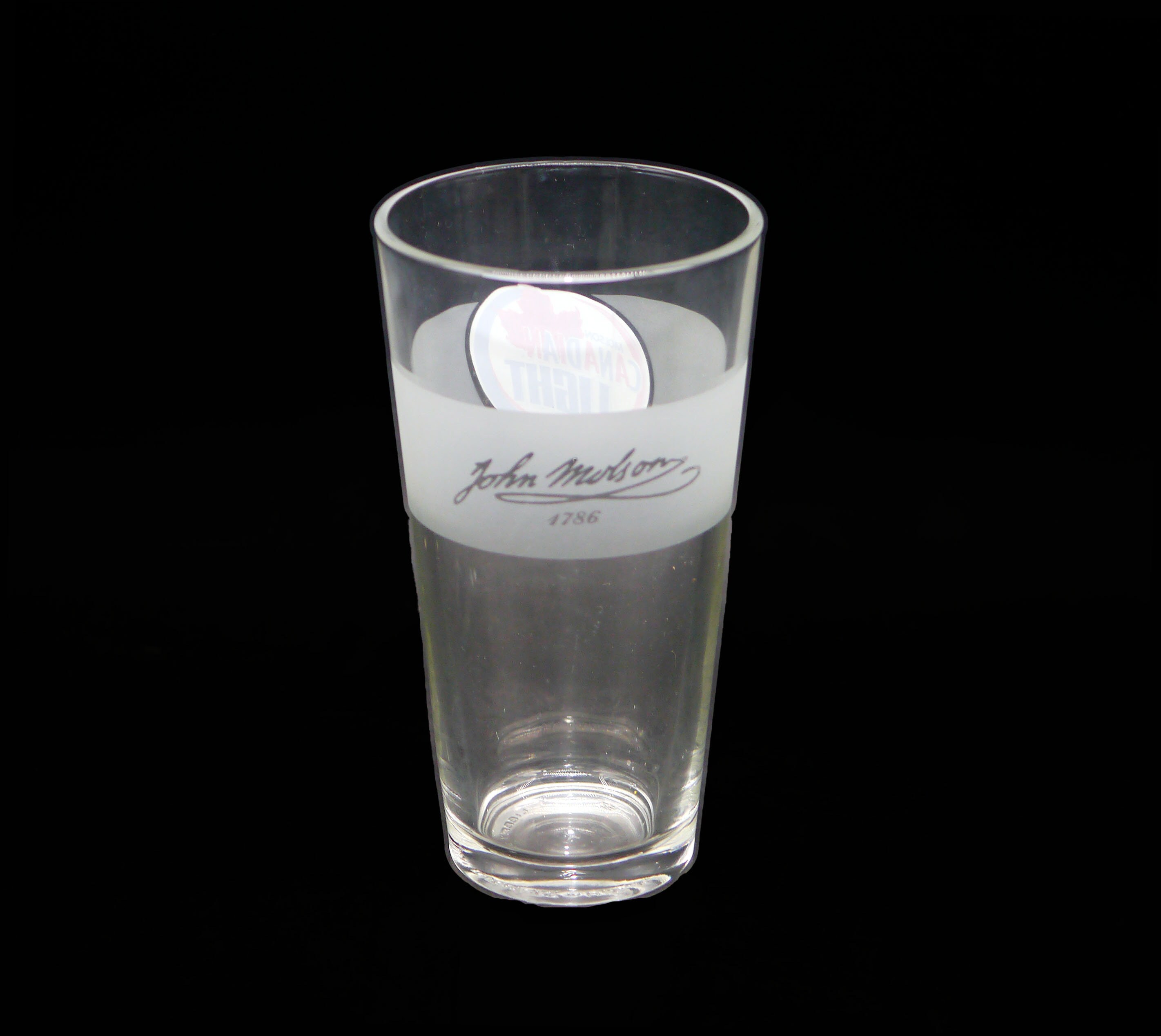 Molson Canadian Light pint glass. Etchedglass branding, frosted