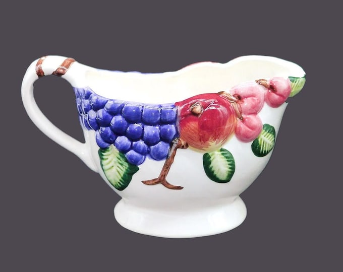 Tabletops Unlimited Tutti Frutti style gravy boat only. Flaw (see below).