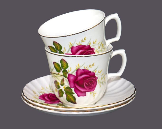 Pair of Ridgway Anniversary Rose cup and saucer sets made in England. Flaw (see below).