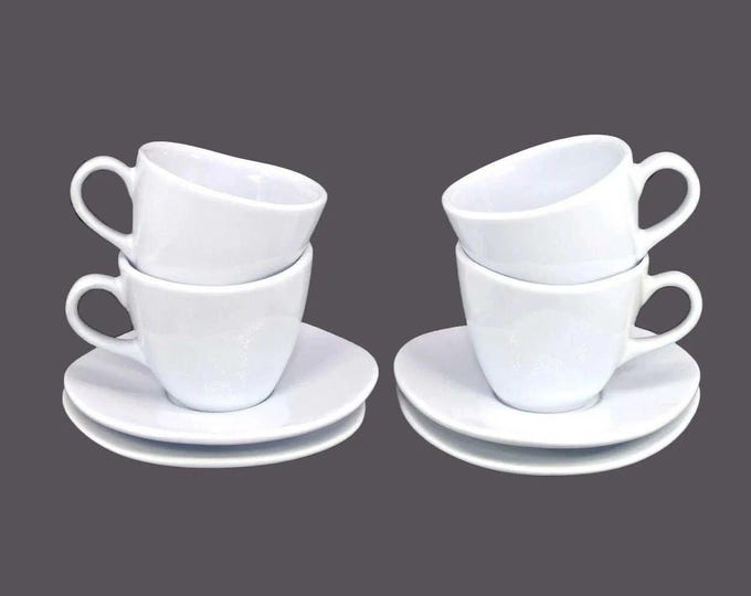 Four MiqueDesign | Mique Sweden cup and saucer sets. Robin's egg blue, asymmetrical shape made in Portugal by SOFAL