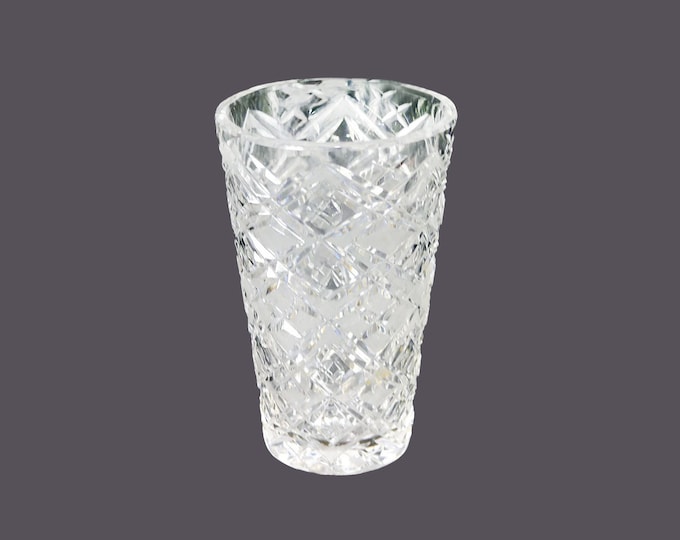 Heavy diamond-cut glass flower vase.