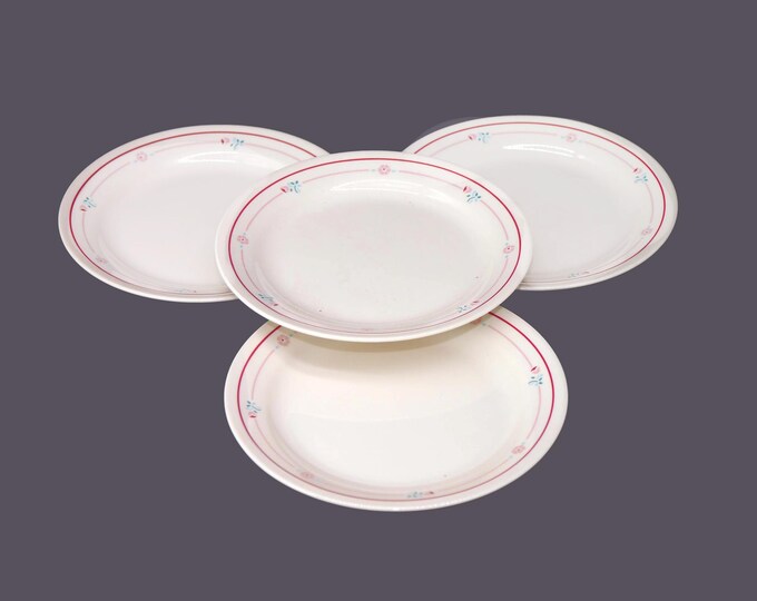 Four Corelle Corningware Cranberry Blossoms salad plates made in USA.