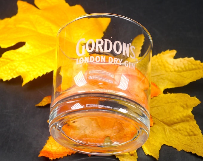 Gordon's London Dry Gin lo-ball, scotch whisky, old-fashioned glass. Etched-glass branding.