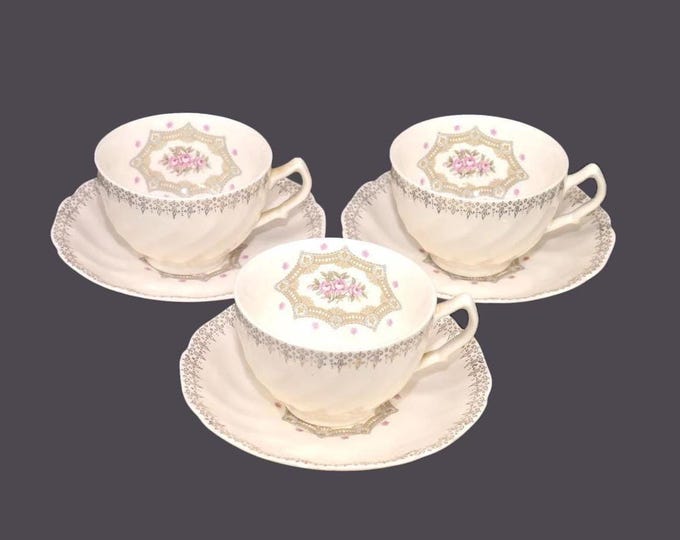 Three Sovereign Potters Fidelity cup and saucer sets. English ironstone decorated in Canada.