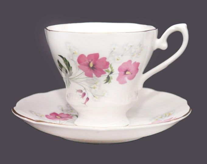 Royal Grafton bone china cup and saucer set made in England. Pink, white, yellow florals, gold edge and accents.