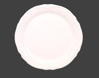 Pier 1 Madeline large dinner plate. Chef's favorite all-white embossed scrolls. Sold individually.