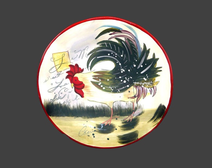 Certified International Le Rooster salad plate designed by Susan Winget. Central rooster, scripted words.