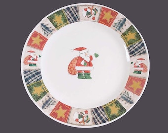 Christmas CX733 stoneware dinner plate. Santa sack of presents. Sold individually.
