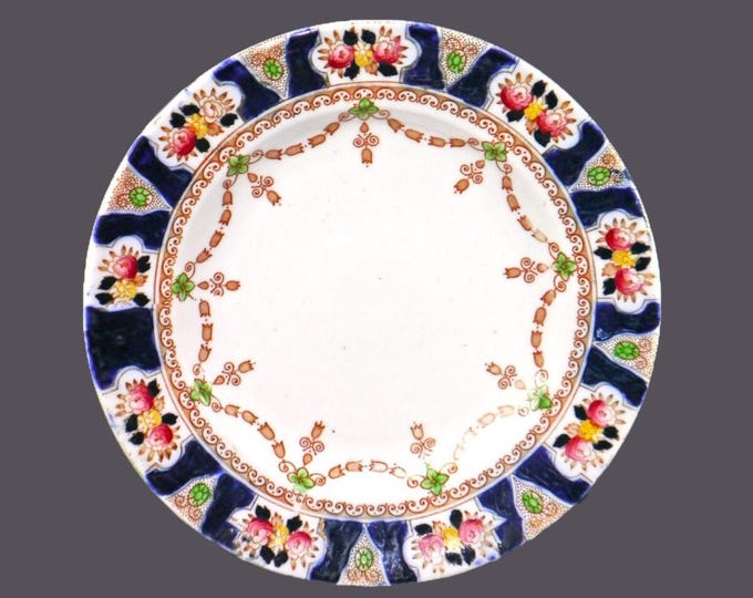 English-made hand-decorated Imari bread plate. Cobalt panels, fruit, gold swags.