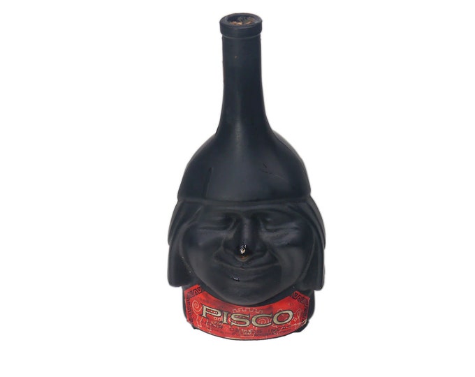 Nogueras Comas Pisco Peruvian brandy Inca Head | Olmec Head decanter | empty bottle. Flaws (see below).