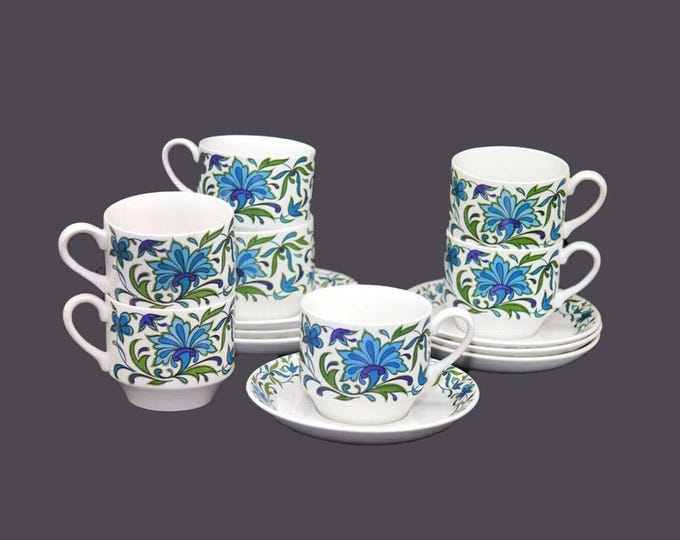 Seven Midwinter Spanish Garden cup and saucer sets made in England. Jessie Tait design.
