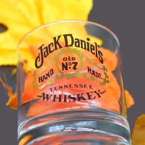 Jack Daniels Sour Mash Tennessee Whisky lo-ball, whisky, on-the-rocks glass.