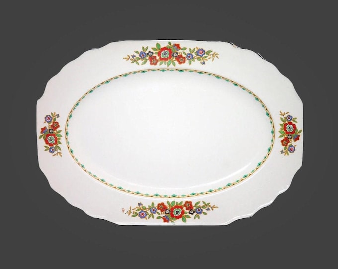 Myott 2614 oval meat platter made in England. Flaw (see below).
