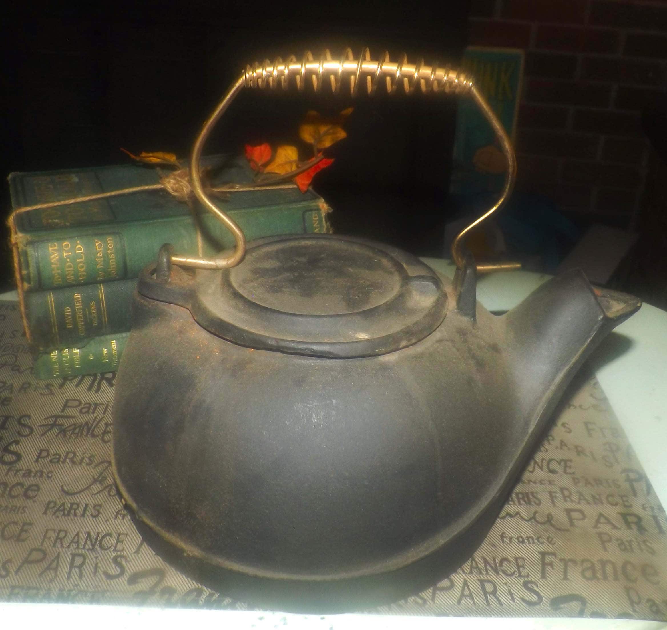 Antique (late 1800s) cast iron kettle teapot with removable metal