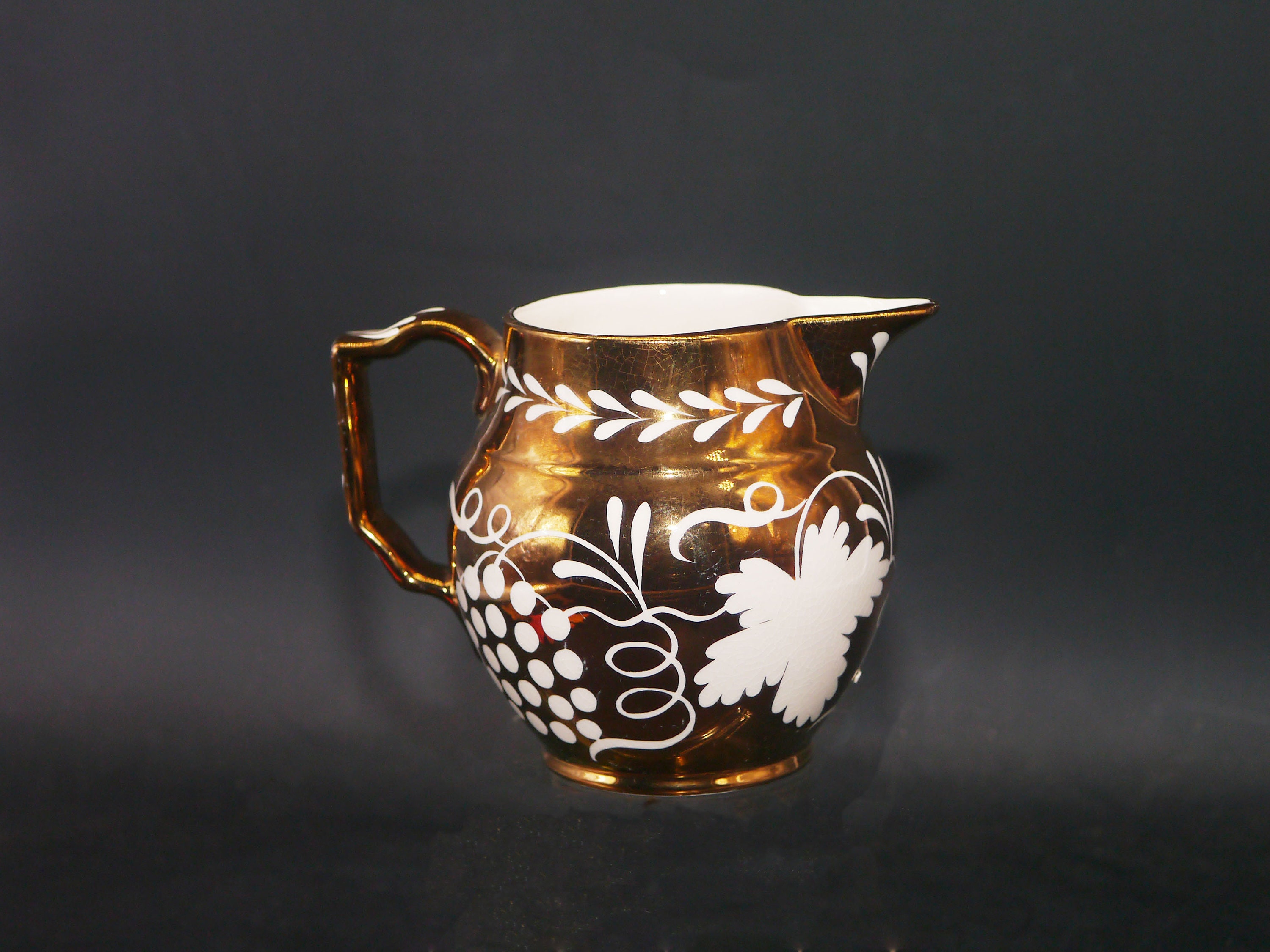 Gray's Pottery A8666 gold luster pitcher made in England.