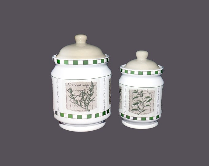 Pair of Himark Savory Tyme vacuum-seal canisters. One large, one small. Various herbs and herb wording.