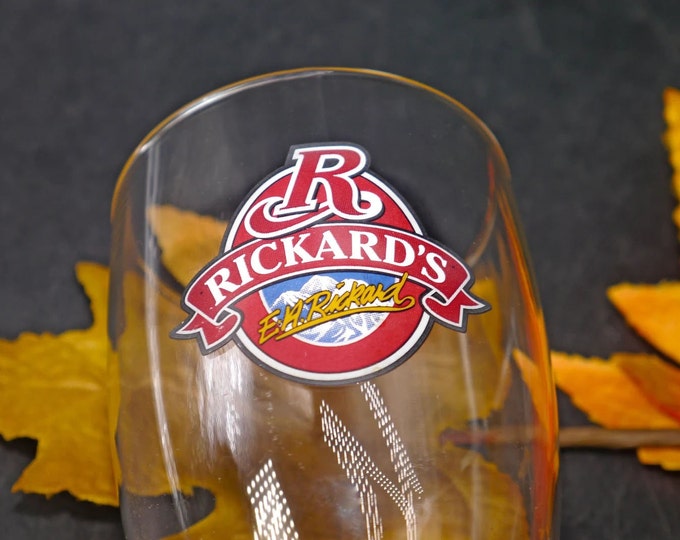 Rickard's Ale glass with signature. Etched-glass branding.