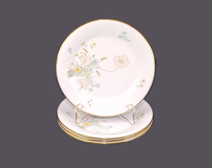 Four Royal Doulton Flirtation H5043 bread, dessert plates. Bone china made in England.