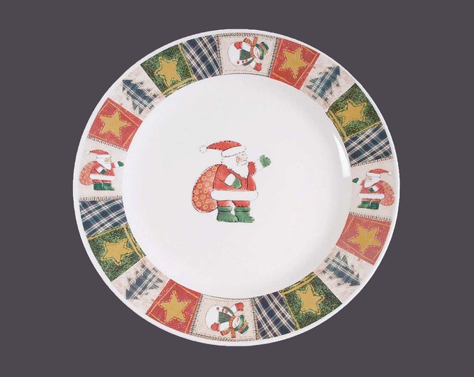 Christmas CX733 stoneware dinner plate. Santa sack of presents. Sold individually.